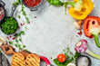 Table with vegetables, spices and condiments. Preparation for cooking. On a stone background. Top view.