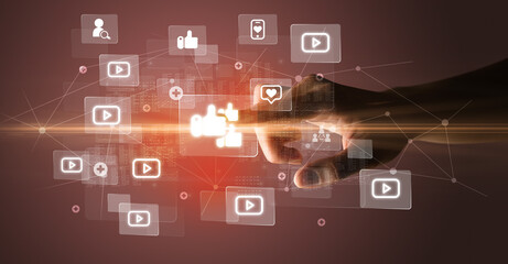 Aufkleber - Hand pressing social media multimedia application screen with media icons on futuristic concept