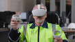 © nimito - Industrial engineer testing augmented reality headset and joystick