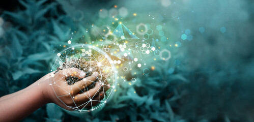 Wall Mural - hands using technology of renewable resources to reduce pollution and carbon emission .