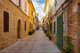 Fototapeta Uliczki - Calle del centro historico de Alcudia, Isla de Majorca, Islas Baleares, Spain