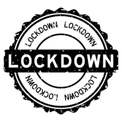 Sticker - Grunge black lockdown word round rubber seal stamp on white background