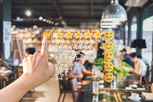 Young Woman Traveler Using Smartphone To Give A Five-star Satisfaction Rating Of The Food And Drinks At Restaurant On Social Media, Travel Lifestyle Concept