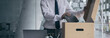 © Puwasit Inyavileart - Put the work equipment in the office in a large brown box, Businessmen are keeping work documents and personal belongings due to resignation or being fired, termination of employment.