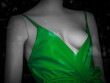 Green woman sexy dress manequin in black background
