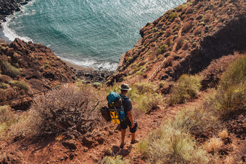hiking down from a cliff