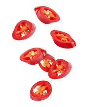 Falling Sliced Red Hot Chilli Peppers Isolated On White Background, Clipping Path