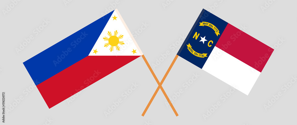 Crossed flags of the Philippines and The State of North Carolina ...
