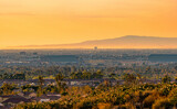 Fototapeta Góry - Suburban Orange County landscape at sunset in Southern California