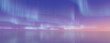 © RocknRoller Studios - Aurora Borealis reflected in Water. Blue Northern Lights Background with copy-space.