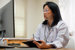 © weedezign - asian woman doctor visit patient video call online diagnose symptom at clinic