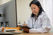 © weedezign - asian woman doctor visit patient video call online diagnose symptom at clinic