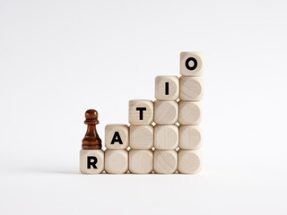 Wall Mural - Chess pawn is climbing the ladder of wooden cubes with the word ratio.