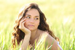 © Antonioguillem - Beautiful woman looking at side in a wheat field