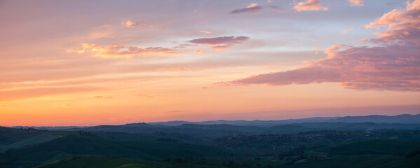 Wall Mural - Beautiful evening sky over the Tuscan landscape