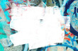 Closeup of colorful teal, gray and red urban wall texture with white white paint stroke. Modern pattern for design. Creative urban city background. Grunge messy street style background with copy space