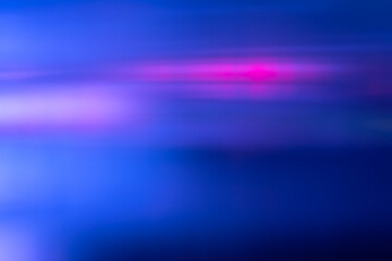 Wall Mural - Defocused light overlay. Blur neon glow. Sci-Fi LED glare. Blur navy blue magenta pink color flare flecks motion futuristic abstract copy space background.