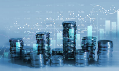 Financial investment and  success market stock technology currency report. Stacks of  coin with trading graph.Business financial chart graph on economy.