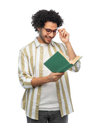 Wall Mural - education, vision and people concept - happy smiling young man in glasses reading book over white background