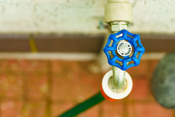 Garden tap with hosepipe attached.