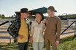 © Svitlana - Mature farmer couple and teenage grandson hugging