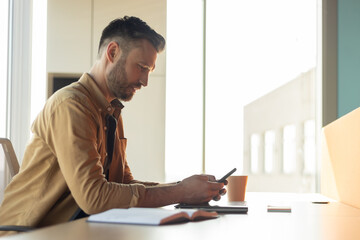 Poster - Business Man Using Mobile Application On Smartphone Working In Office