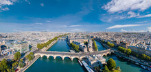 Paris Aerial Panorama With River Seine, Pont Neuf Bridge, Ile De La Cite And Notre-Dame Church, France. Holidays Vacation Destination. Panoramic View Above Historical Parisian Buildings And Landmarks.