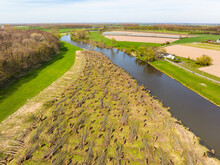 Aerial View Of River Linge With Road And Pollarded Willow Forest, Marienwaerdt, Betuwe, Gelderland, Netherlands.