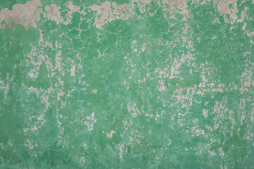 Wall Mural - Green cement wall texture with peeling paint on the surface. For texture and background