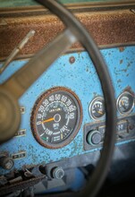Vertical Shot Of A Rusty Car Dashboard With Dials And Indicators - Empty Fuel Concept