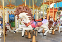Merry-go-round With Horses In An Amusement Holiday Park