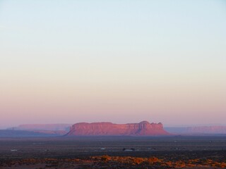 Landscape of the deserts with sandstone buttes in Utah at the golden hour