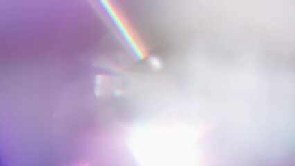 Wall Mural - Optical Refraction in Violet Tones. Loop. The light passes through the facets of a slowly rotating diamond and creates repetitive sparkling highlights and rainbow colors