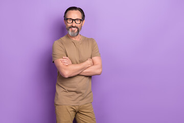 Wall Mural - Photo of successful businessman it-specialist working in modern company isolated on purple color background