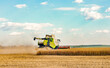 © Evgeniy Kozlov - Combine harvesting spring wheat. Wheat and corn are reacting to markets in the breadbasket of the global crisis. Yield of winter barley. Wheat, corn, soy.