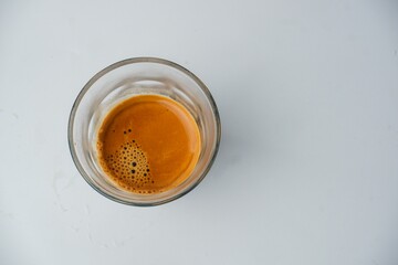 Poster - Glass cup of espresso coffee isolated on the white background