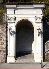 Sticker - Vertical shot of the beautiful antique arch made of white stone.