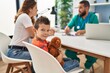 © Krakenimages.com - Family having medical consultation and child holding teddy bear at clinic