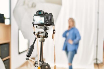 Poster - Caucasian woman posing as model at photography studio