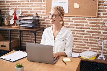 Poster - Young blonde woman business worker using laptop working at office