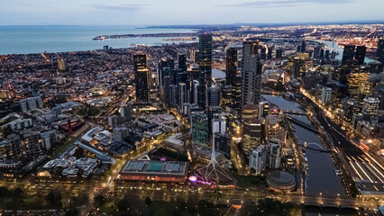 Poster - Aerial drone view of Melbourne City, Victoria, Australia looking in the direction of Port Phillip above Yarra River in the early morning at dawn 