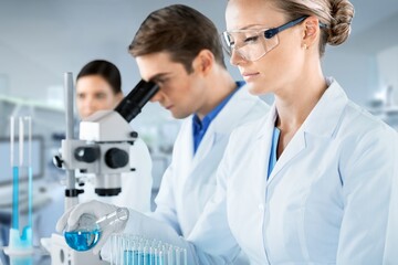 Canvas Print - Female young Scientist Working in The Lab