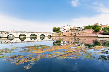 Wall Mural - The edge of San Giuliano and The Augustus Tiberius Bridge in Rimini