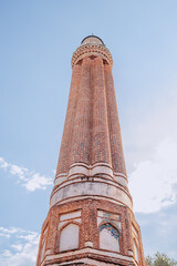 Wall Mural - Yivli or flute minaret mosque is a religious symbol and travel landmark of Antalya resort town in Turkey. Attractions and destinations