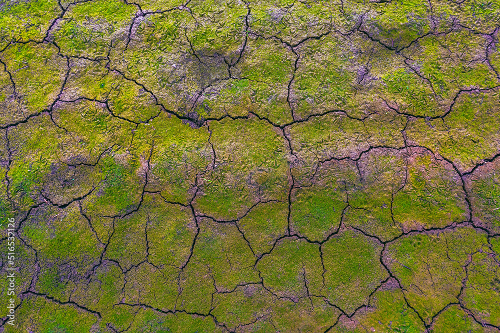Nature background of cracked dry lands. Natural texture of soil with ...