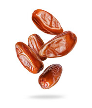 Delicious Dried Dates In The Air Closeup On A White Background