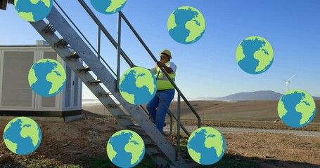 Poster - Animation of globes over biracial male engineer and wind turbine