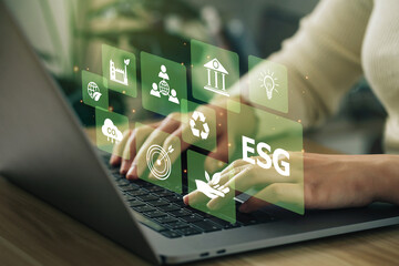 esg environment social governance investment business concept. women use a computer to analyze esg, 