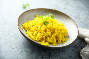 Canvas Print - Healthy vegan turmeric rice with fresh parsley