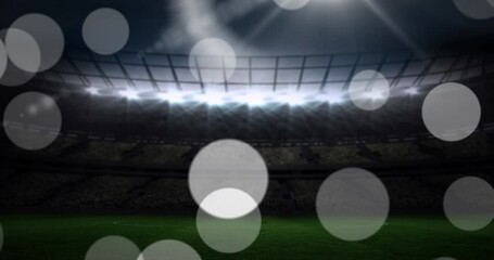 Poster - Animation of failing spots and glowing lights over football stadium
